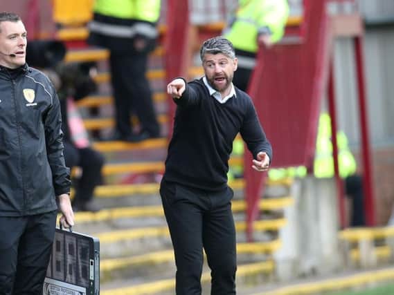 Stephen Robinson went through a wild range of emotions watching Motherwells incredible 4-3 success over Dundee (Pic by Ian McFadyen)