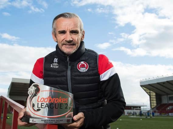 Danny Lennon with the Ladbrokes League Two Manager of the Month award (pic by SNS)