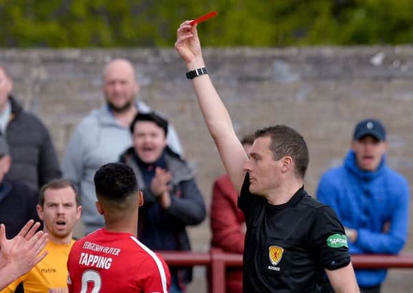 Conor McBrearty (Stenhousemuir) is sent off after getting a red card from referee Euan Anderson during the Scottish League 1 match between Brechin City and Stenhousemuir at Glebe Park, where a draw was enough to see Brechin City relegated to League 2.

(c) Dave Johnston