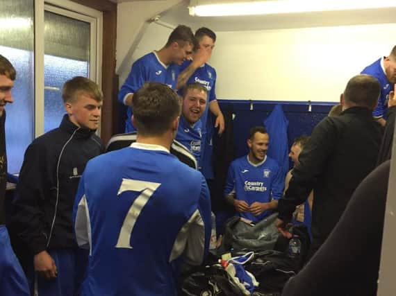 Lanark United players celebrate winning the McBookie.com League Two crown (Pic by George Reid)