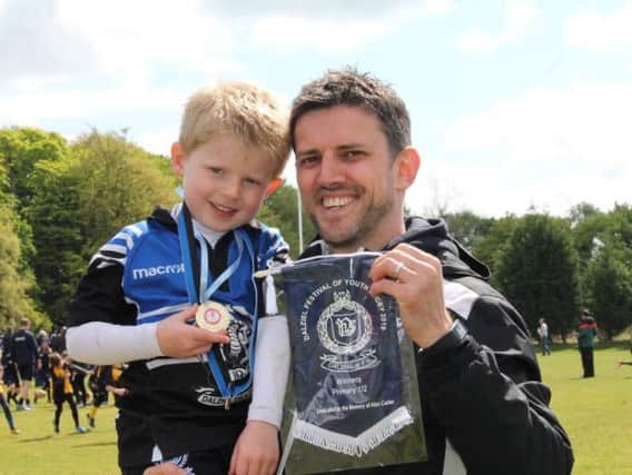 Dalziel Rugby Club head coach Graham Calder with his son Alan (Submitted pic)