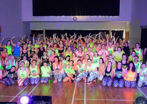 The clubbers grabbed their glow sticks for a good cause
