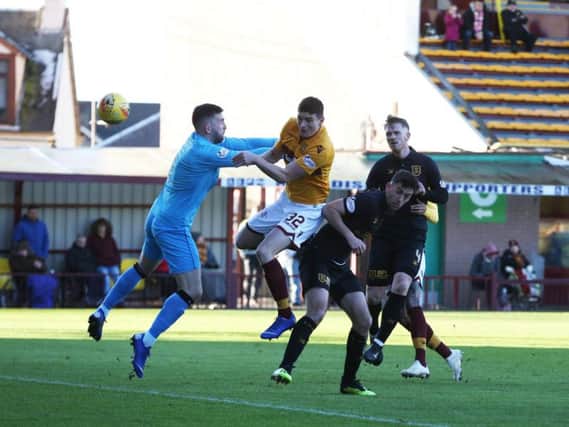Jake Hastie heads home one of the two goals he scored for Motherwell in a 3-0 Fir Park win over Livingston on February 2, the last time the two sides met in the league (Pic by Ian McFadyen)