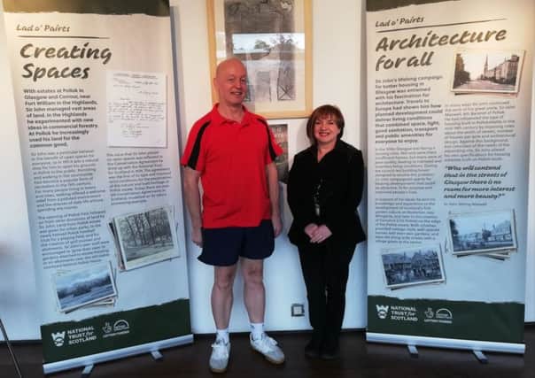 Eastwood Leisure venue assistant Peter Wilson, from Pollok, and customer advisor Sandra Reid, from Erskine, check out the exhibition at Eastwood Park, where it is on display until Thursday, May 23, before moving to Giffnock Library.