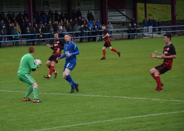 Action from Saturdays clash between Rob Roy and Auchinleck Talbot at Guys Meadow