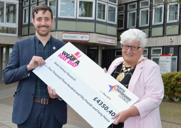 Joe Woolcott, Scottish Community Fundraising Manager for Brain Tumour Research with Provost Jones.