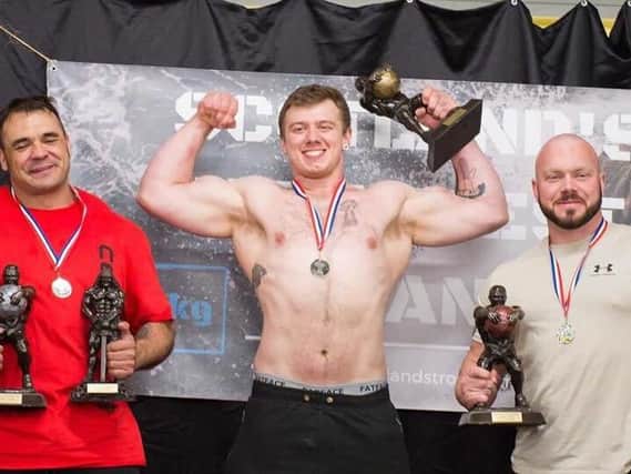 Motherwells Callum Crozier (centre) is pictured after winning Scotlands Strongest Man title in Fraserburgh by 11 points (Submitted pic)