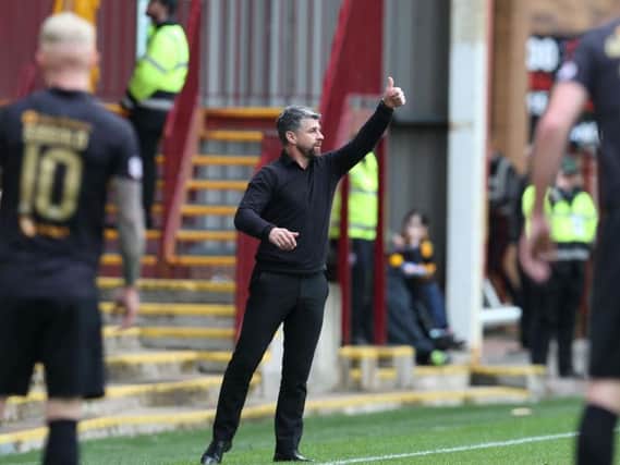 Stephen Robinson encourages his troops against Livingston (Pic by Ian McFadyen)
