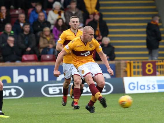 Grimmy in action against Livingston (Pic by Ian McFadyen)