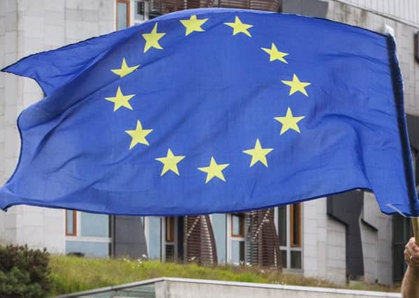 European Union flag outside Holyrood.
Hundreds of Remain supporters gather outside the Scottish Parliament as First Minister Nicola Sturgeon seeks a mandate from parliament to protect Scotland's pace in the EU. June 28 2016