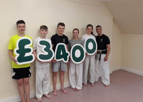 Wado Kai Central Karate Club which has classes in Holytown and Shotts held a charity football match in aid of Macmillan Cancer Support