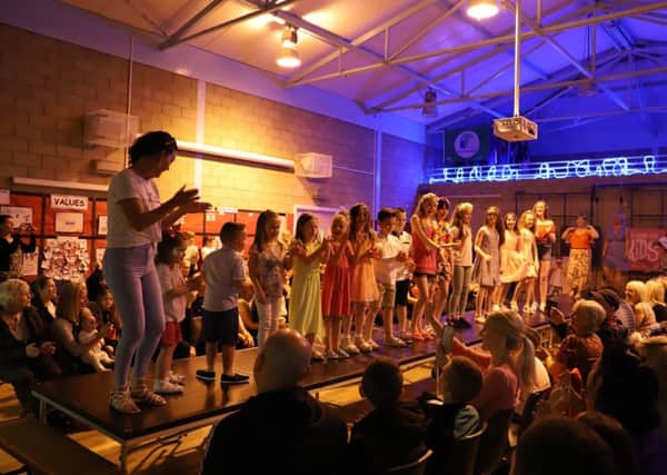 The fashion show at Balmalloch Primary raised £1000