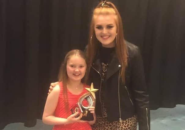 Aimee Bryceland (right) was invited to be a special guest at the Kilsyth Civic Week talent show, and is pictured with overall winner Bronagh Cullen