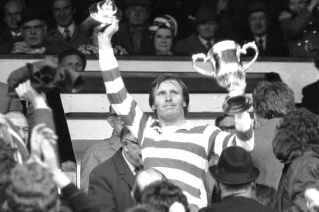 Celtic captain Billy McNeill lifts the Scottish Cup in 1974