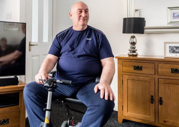 MND Scotland recently found a mobility scooter which Ian Cartwright can use to get around at at work