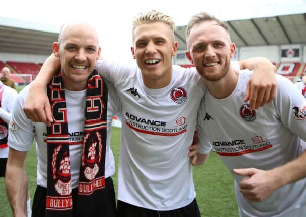 Tom Lang (centre) celebrates with Kevin Nicoll and Martin McNiff after Clyde's promotion play-off win over Annan (pic by Craig Black Photography)