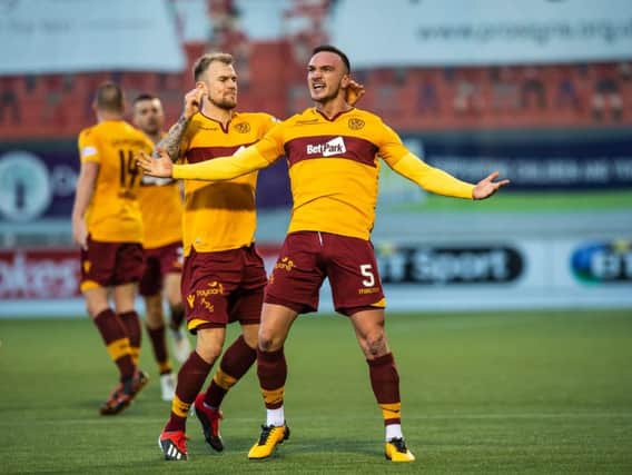 Tom Aldred celebrates with Richard Tait after scoring one of his two goals in a 2-1 league win at Hamilton Accies on December 29 last year (Pic by Ian McFadyen)