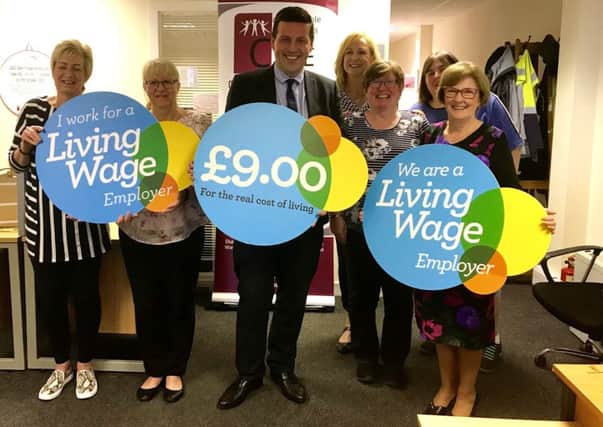 Cumbernauld and Kilsyth MSP Jamie Hepburn met staff from CACE to celebrate their achievement of Living Wage accreditation
