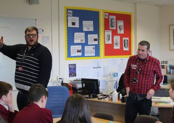 Jonathan Davie and David Graham, from Hamilton and East Mains Baptist Churches respectively, talk to pupils