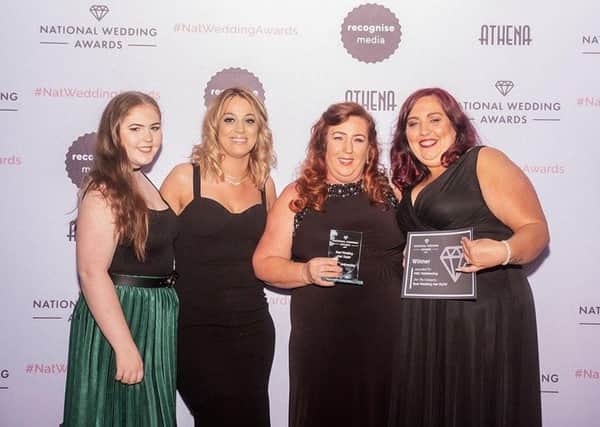 The team from HQC Hairdressing celebrate their success.