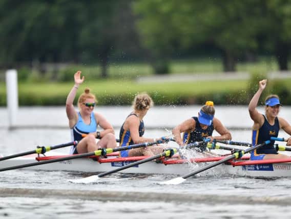 Perri McCluskey celebrates Henley victory with her crew (Pic by Tom Asteriades)