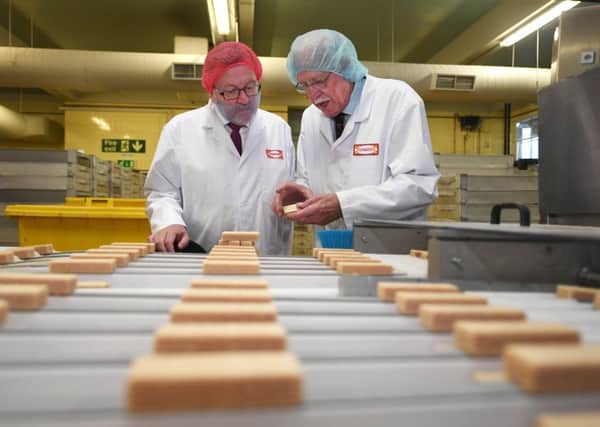 Boyd Tunnock gives 
Scottish Secretary David Mundell a tour of the manufacturing operation