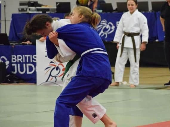 Lily Rafferty (right) in judo action (Submitted pic)