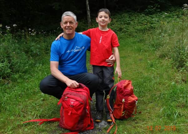 Ewen Cameron and his son Fraser (8) are to undertake a 200 mile cattle trail trek for charity.