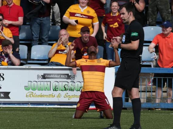 Sherwin Seedorf celebrates his fine goal at Palmerston in front of Motherwell supporters (Pic by Ian McFadyen)