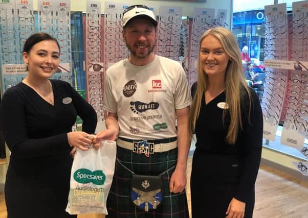Jay in the Newton Mearns store with Kelsey (left) and Caroline (right).