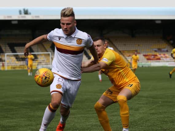 Motherwell's James Scott in action at Livingston on Saturday (Pic by Ian McFadyen)