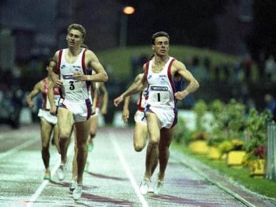McKean (right) battles GB team-mate Brian Whittle in 1991