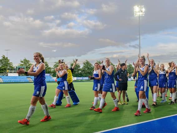 Scotland's players celebrate with their supporters after clinching promotion (pic: Duncolm Photography)