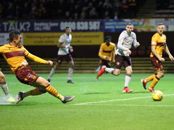 Christopher Long shoots home Motherwell's goal against Hearts (Pic by Ian McFadyen)
