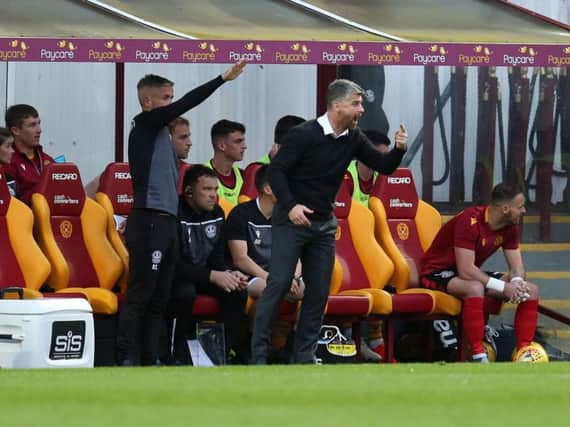 Motherwell manager Stephen Robinson encourages his side against Hearts (Pics by Ian McFadyen)