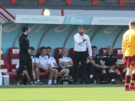 Motherwell manager Stephen Robinson speaks to the fourth official during Motherwell's 1-1 league draw at Hamilton on their last visit on April 20 (Pic by Ian McFadyen)