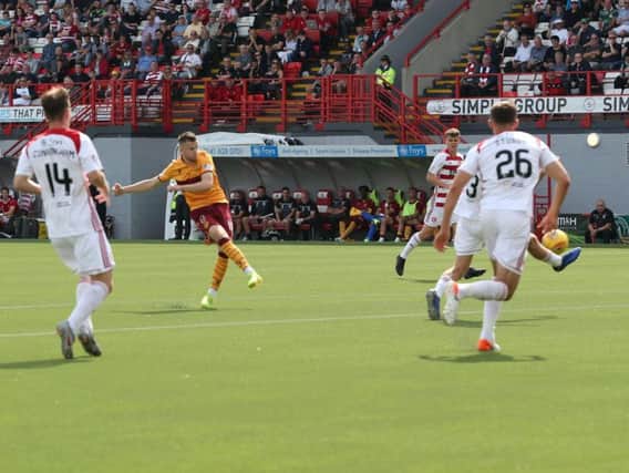 Liam Polworth launches a first half effort on goal for Motherwell at Hamilton (Pic by Ian McFadyen)