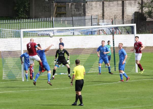 Cumbernaulds Paddy McCabe heads for goal during his side's derby win over Kilsyth Rangers at Duncansfield.