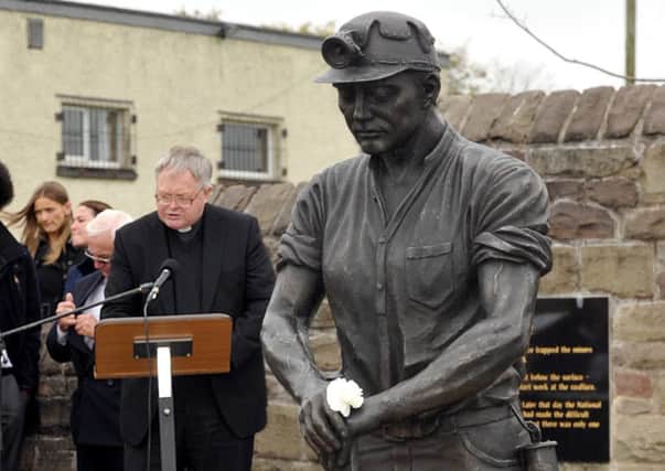 Auchengeich Mining Memorial - Annual Service - Father Michael Briody saying a pray
14th September 2014
