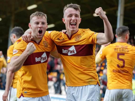 David Turnbull (right) celebrates a Motherwell goal last season with Allan Campbell