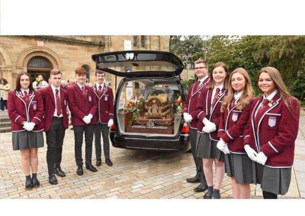St Ninian's pupils who carried the Relics of St Therese of Lisieux into St Mirin's RC Cathedral (Photo: Paul Mc Sherry)