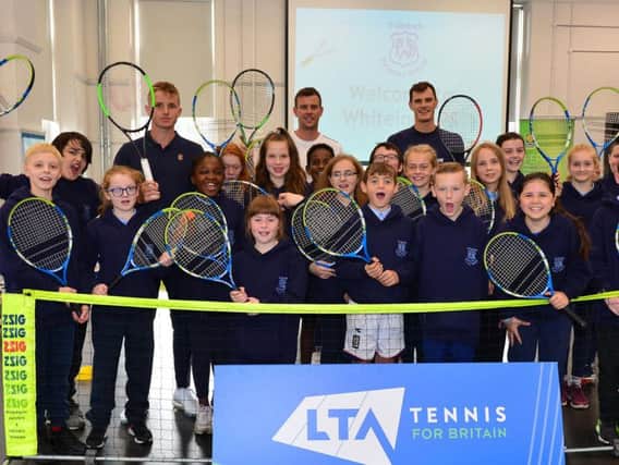 Aidan McHugh, Leon Smith and Jamie Murray with the delighted Whiteinch pupils