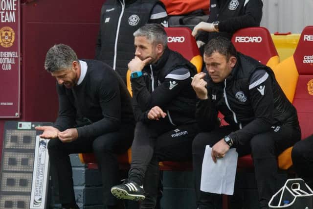Motherwell manager Stephen Robinson (left) has been rocked by Darren O'Dea departure