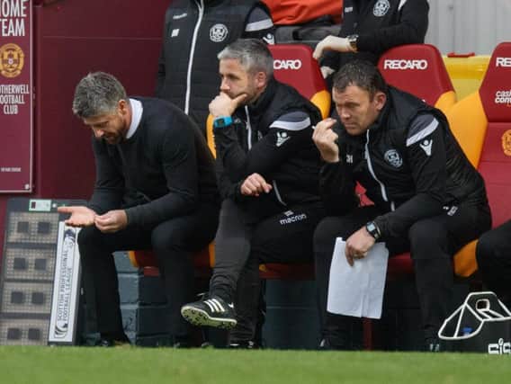 Motherwell manager Stephen Robinson (left) has been rocked by Darren O'Dea departure