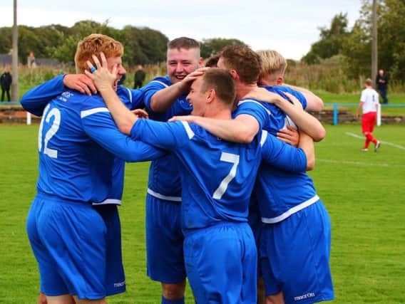 Lanark United players celebrate scoring during Saturdays emphatic 4-1 success over Girvan (Pic by George Reid)