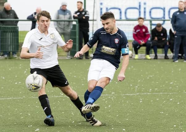 Kieran McAleenan (right) scored and missed from the spot for Cumbernauld (archive pic: David Rankin).
