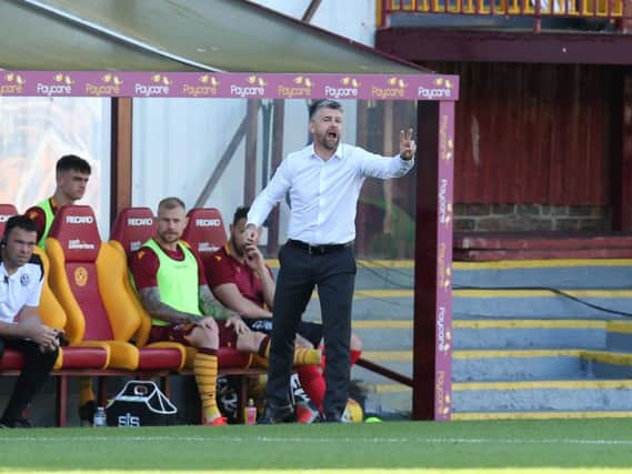 Stephen Robinson watches his team losing their first match in four against Ross County (Pic by Ian McFadyen)