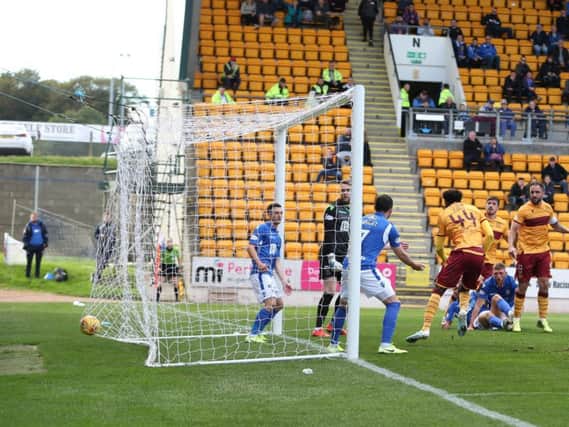 The ball nestles in the net for 1-0 Motherwell after Devante Cole's goal at McDiarmid Park (Pic by Ian McFadyen)