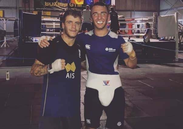Nathaniel Collins (right) is unbeaten since turning pro after last year's Commonwealth Games