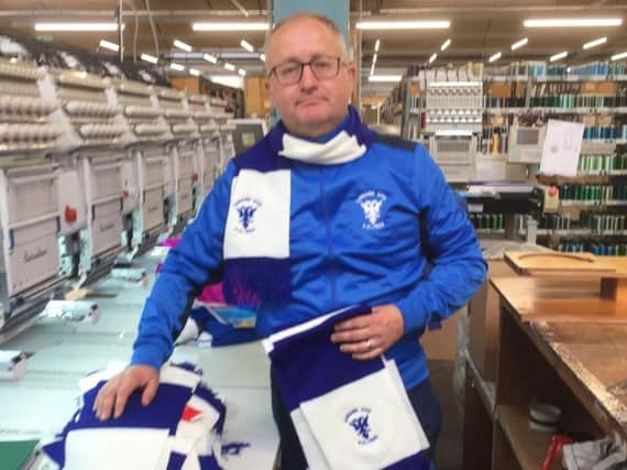 Andy Irving with newly embroidered Lanark United scarves